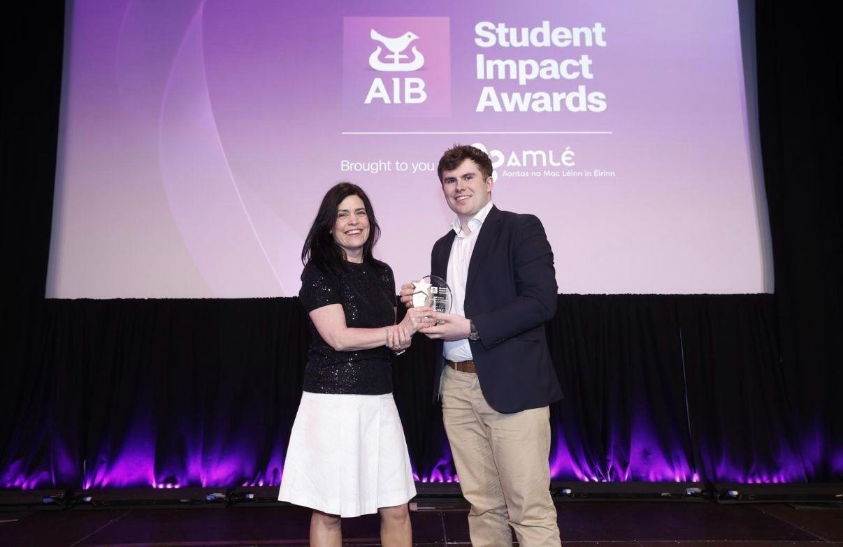 Sean Barrett receiving the award on stage at Croke Park.