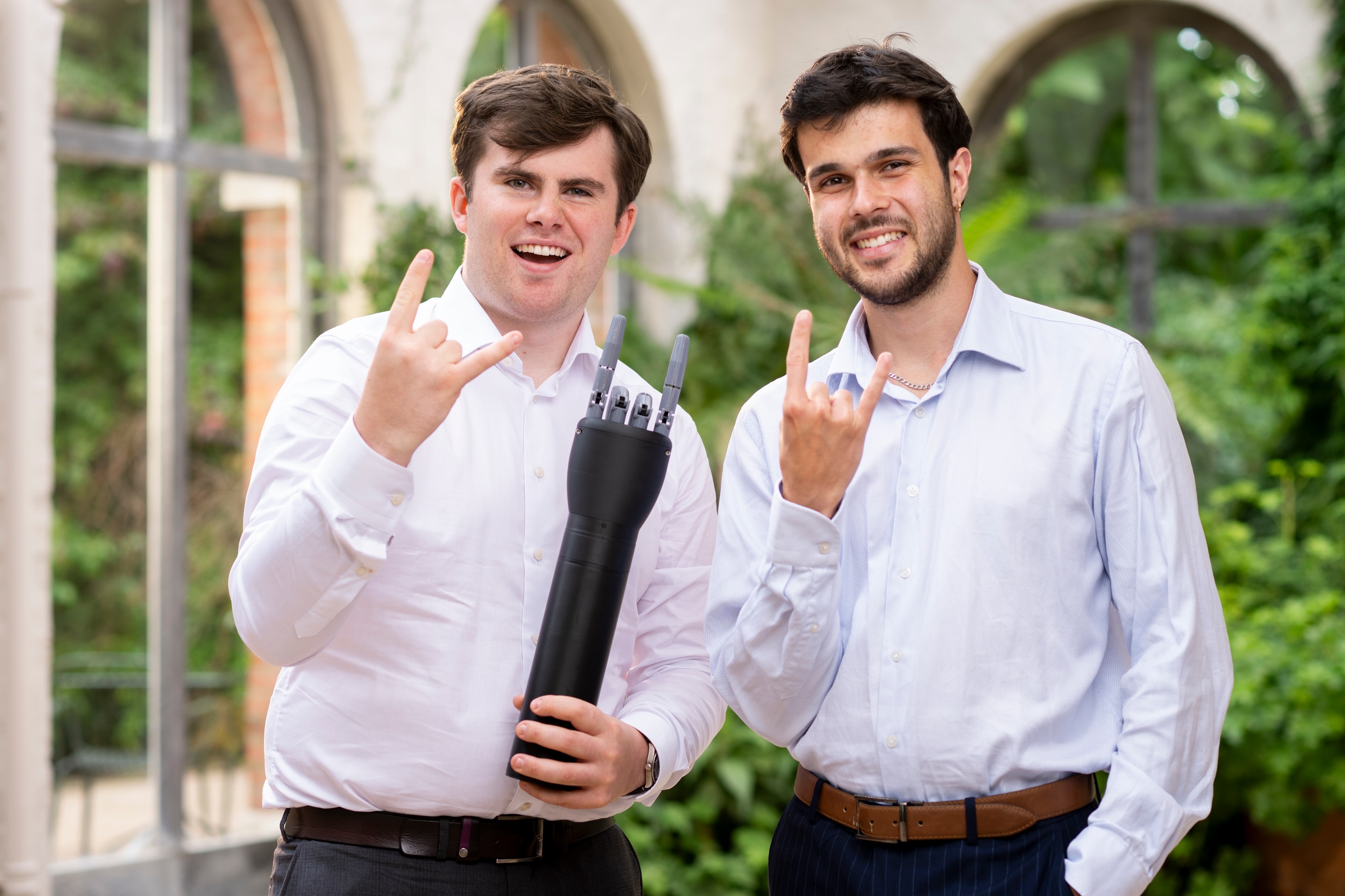 Sean Barrett, left, and William Hartley, right, holding the Diego hand.